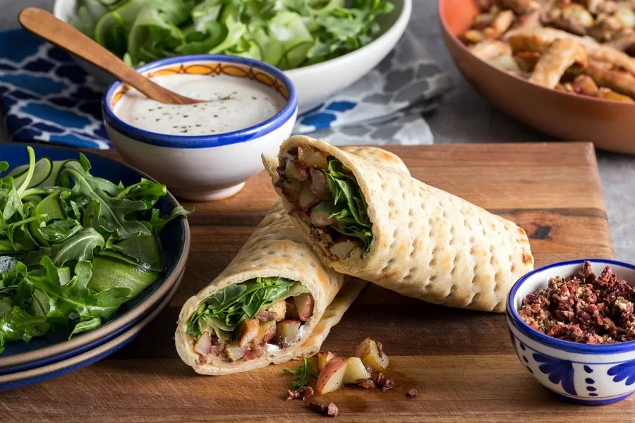 Lavash Wraps with Pork, Cucumber Ribbons, Feta, and Olives